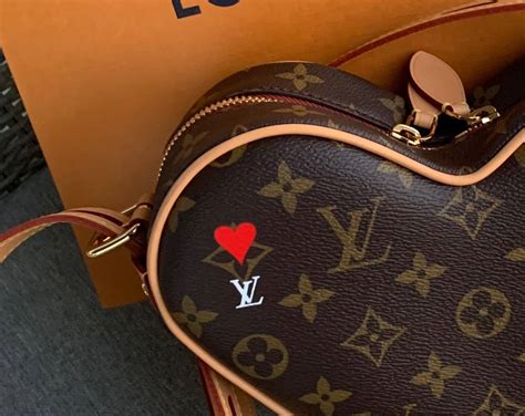 louis vuitton stuffed animal bag|louis vuitton heart shaped bag.